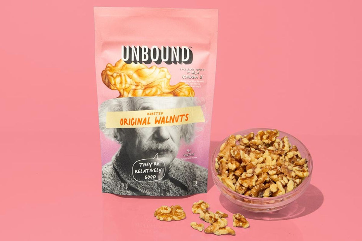Unbound Original Walnuts pouch with a bowl of the original walnuts